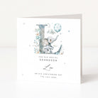 Christening card for grandson with an elephant illustration and personalized text on a white background