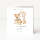Personalised christening card for nephew with teddy bear and letter 'J' on a white background