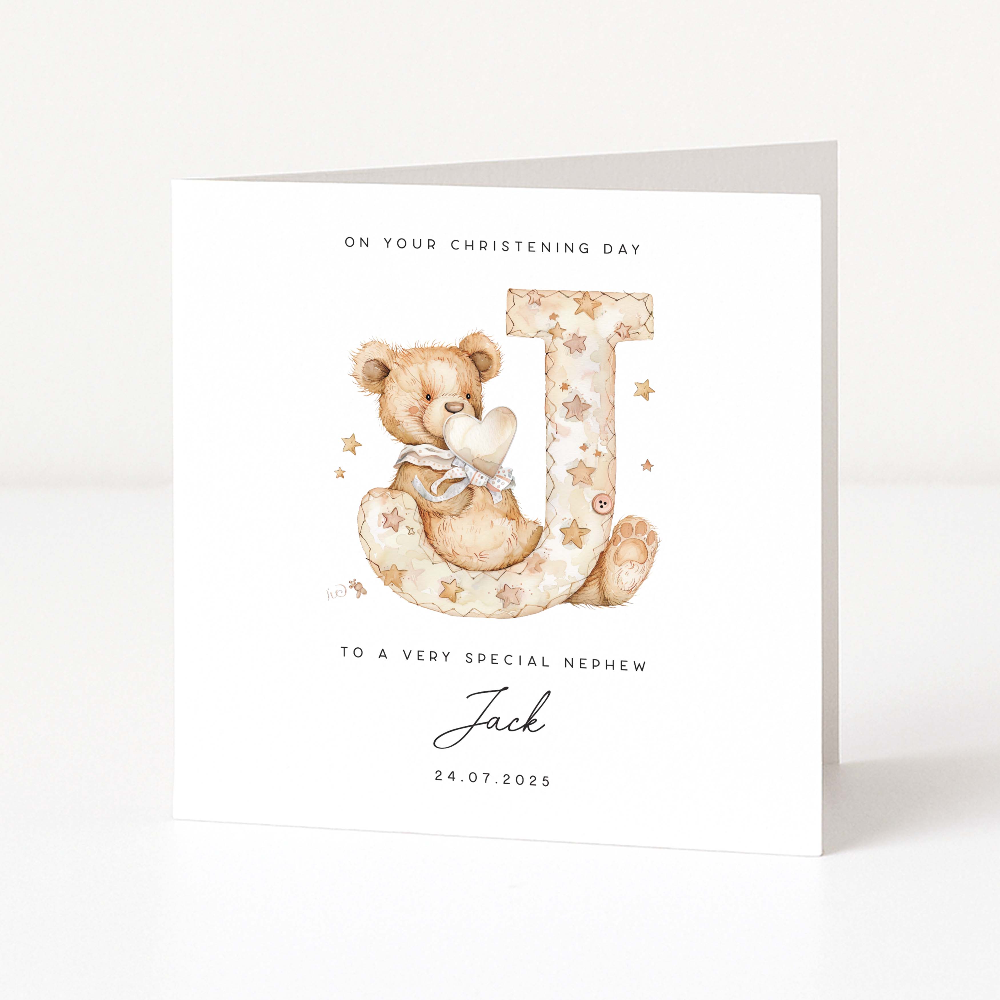 Personalised christening card for nephew with teddy bear and letter 'J' on a white background