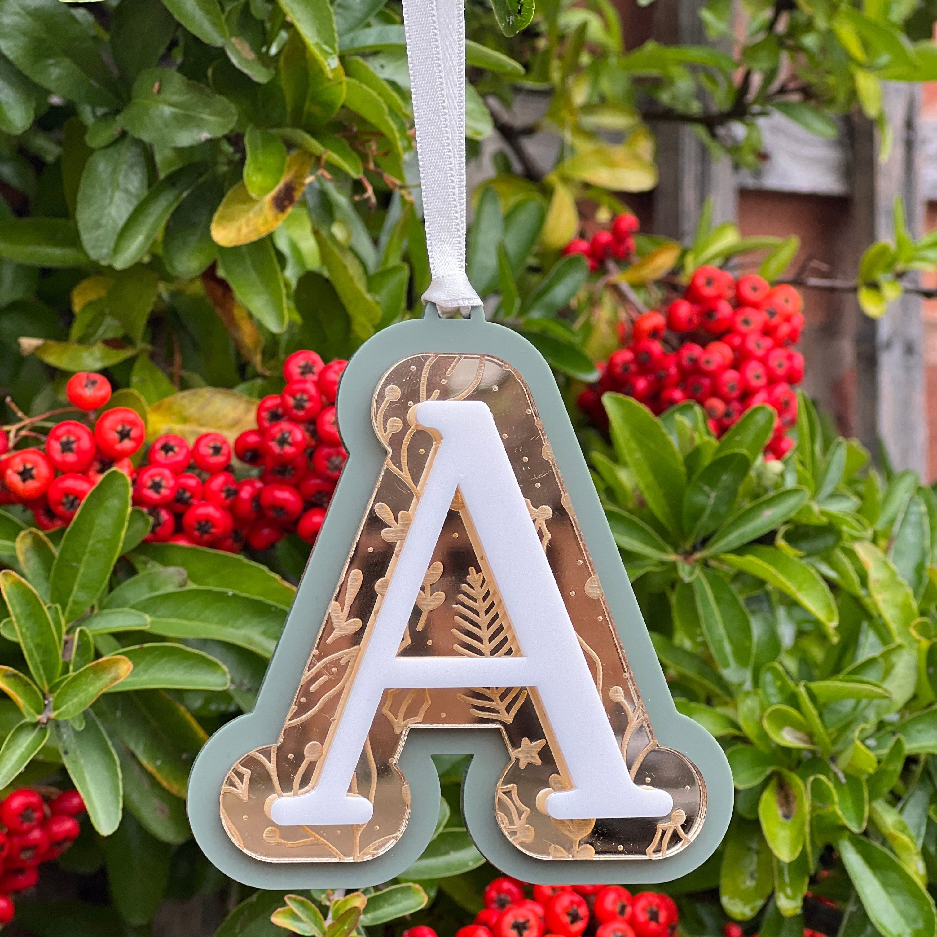 Luxury 3-layered engraved christmas bauble made from a single initial with gold mirror acrylic and ivory satin