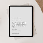Digital tablet displaying a wedding save-the-date invitation with 'Madeleine & Andrew' on a light background.