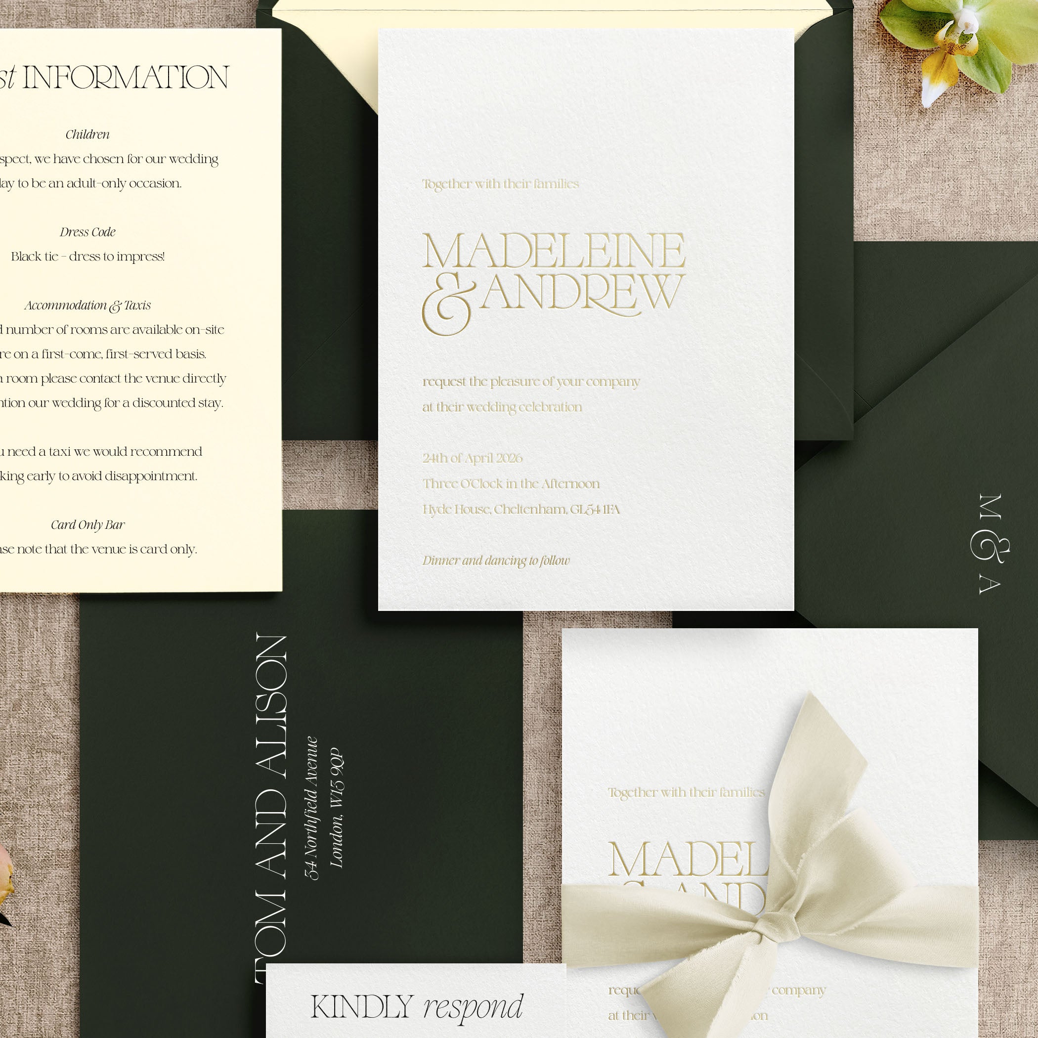Collection of wedding invitations with text and decorative elements on a textured surface.