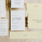 Wedding Invitation with enclosure cards and pale yellow envelopes and accessories