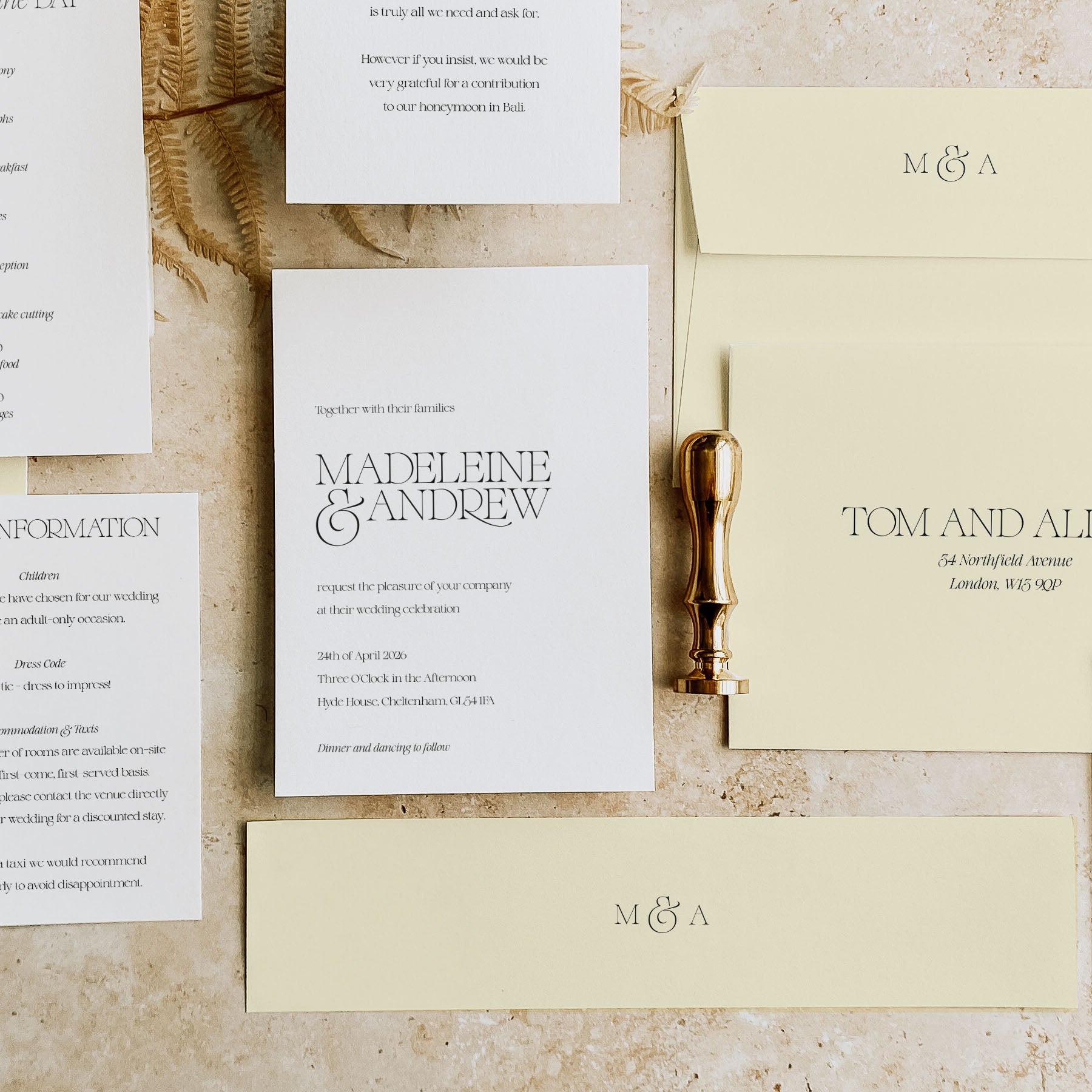 Wedding Invitation with enclosure cards and pale yellow envelopes and accessories