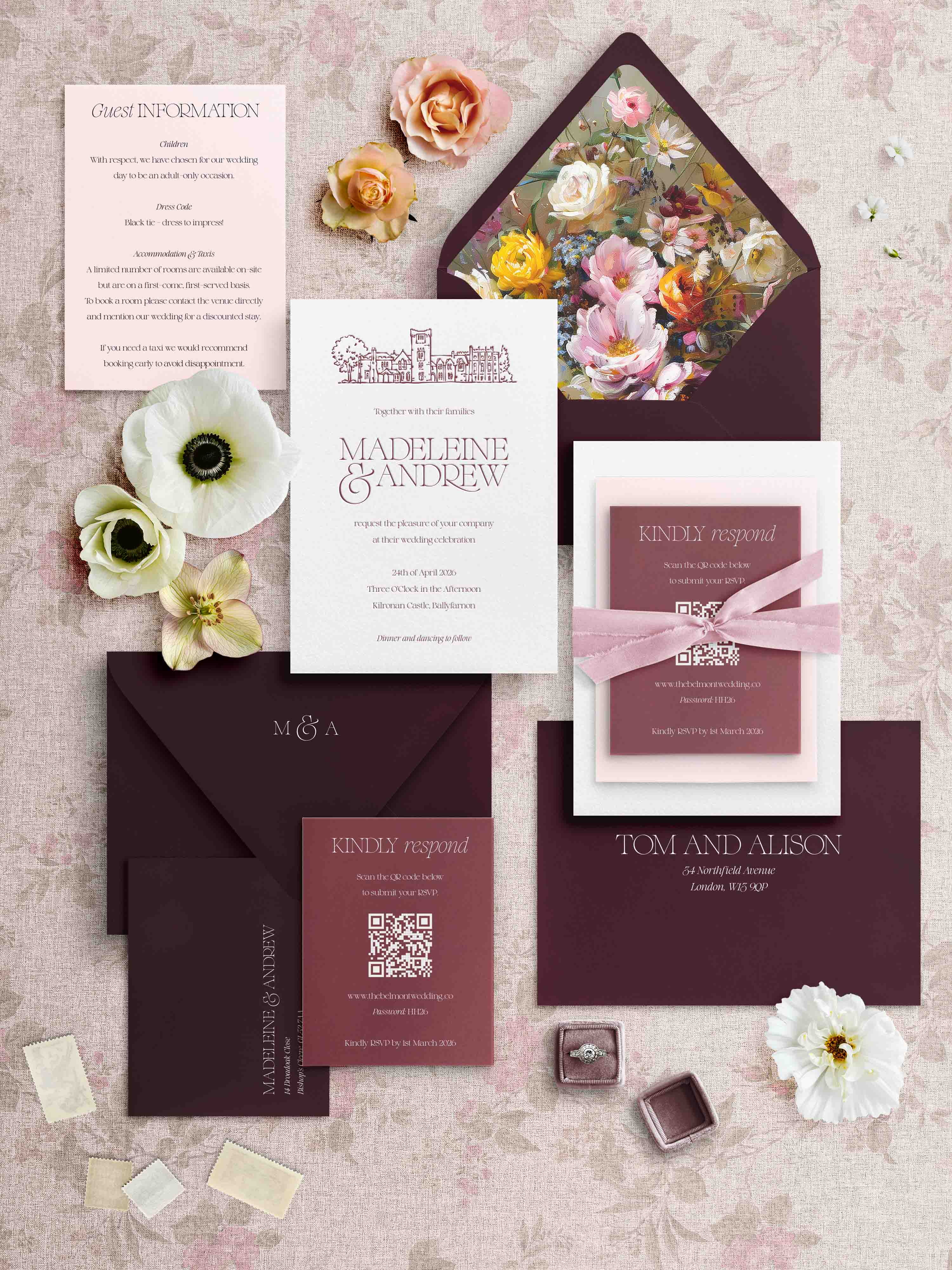 Letterpress Wedding invitation set with floral elements on a textured surface
