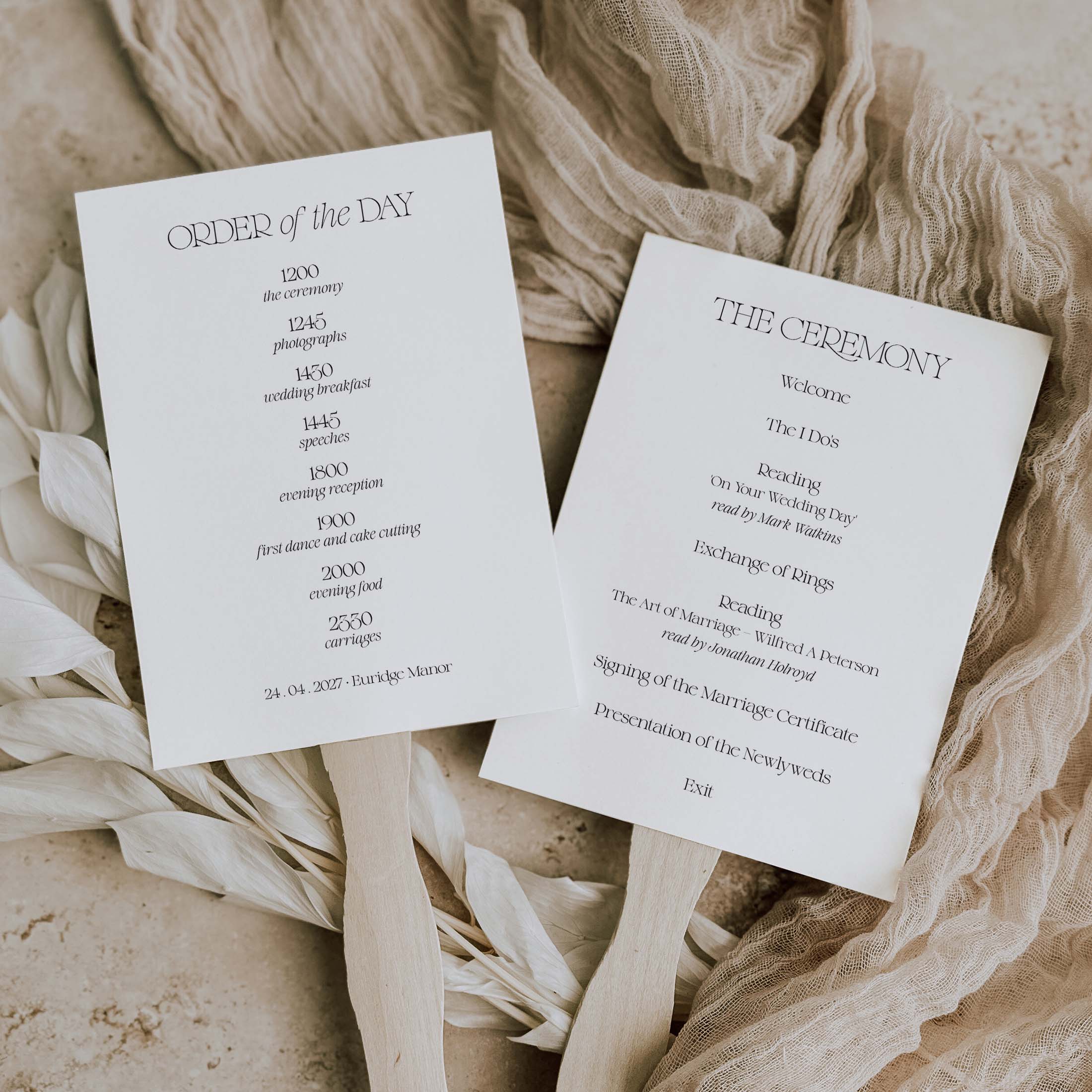 Wedding ceremony programs on a textured fabric background