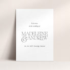 Wedding welcome sign with names 'Madeleine & Andrew' on a beige background