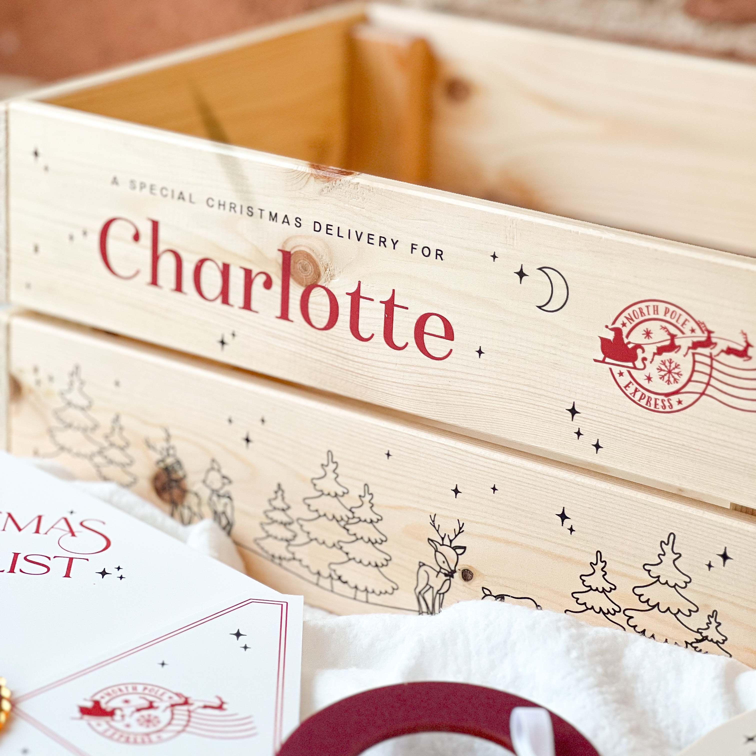 Wooden Christmas Eve box with personalised text and Christmas-themed design, featuring a Santa Claus stamp.