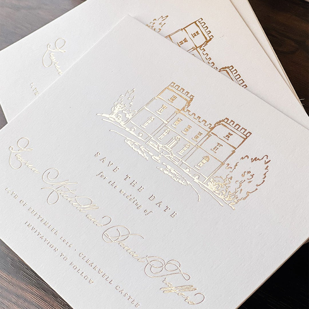 Gold foil and white cardstock save the date cards for wedding