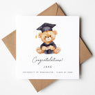Graduation-themed card with a teddy bear in a cap and gown, surrounded by brown envelopes on a white background.