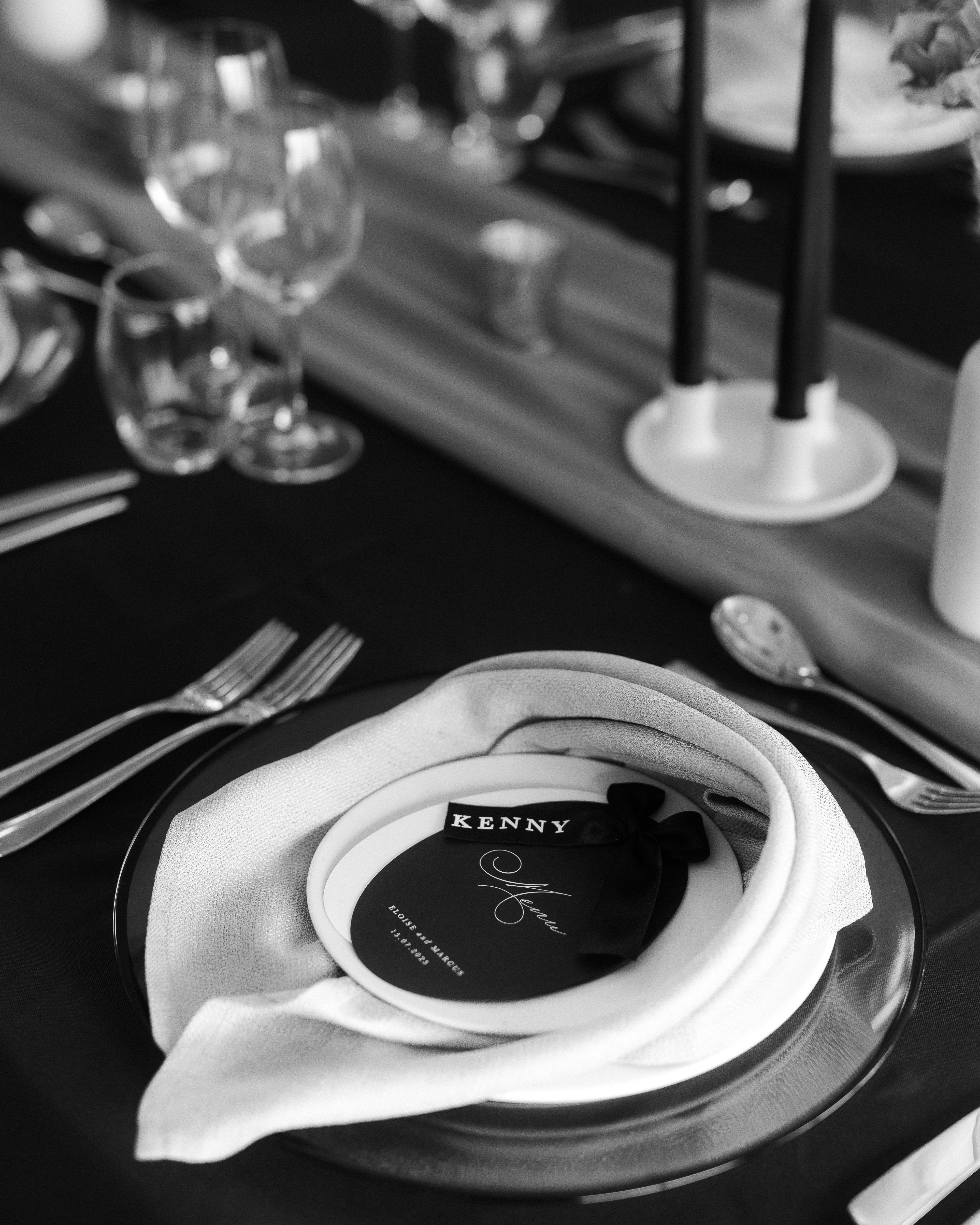 Wedding Dining table setting with a name card on a napkin