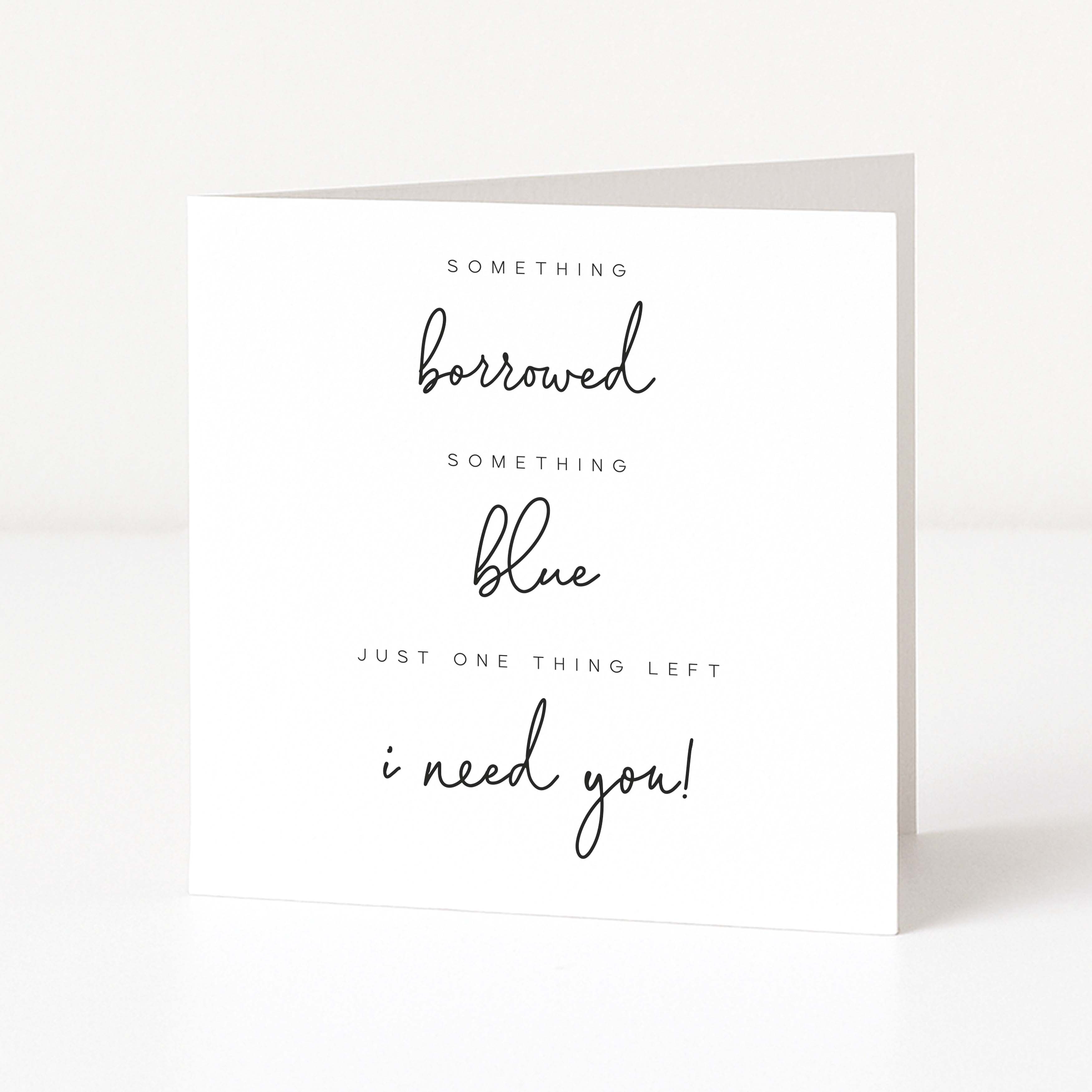 Greeting card with text 'Something borrowed, something blue, just one thing left, I need you!' on a white background