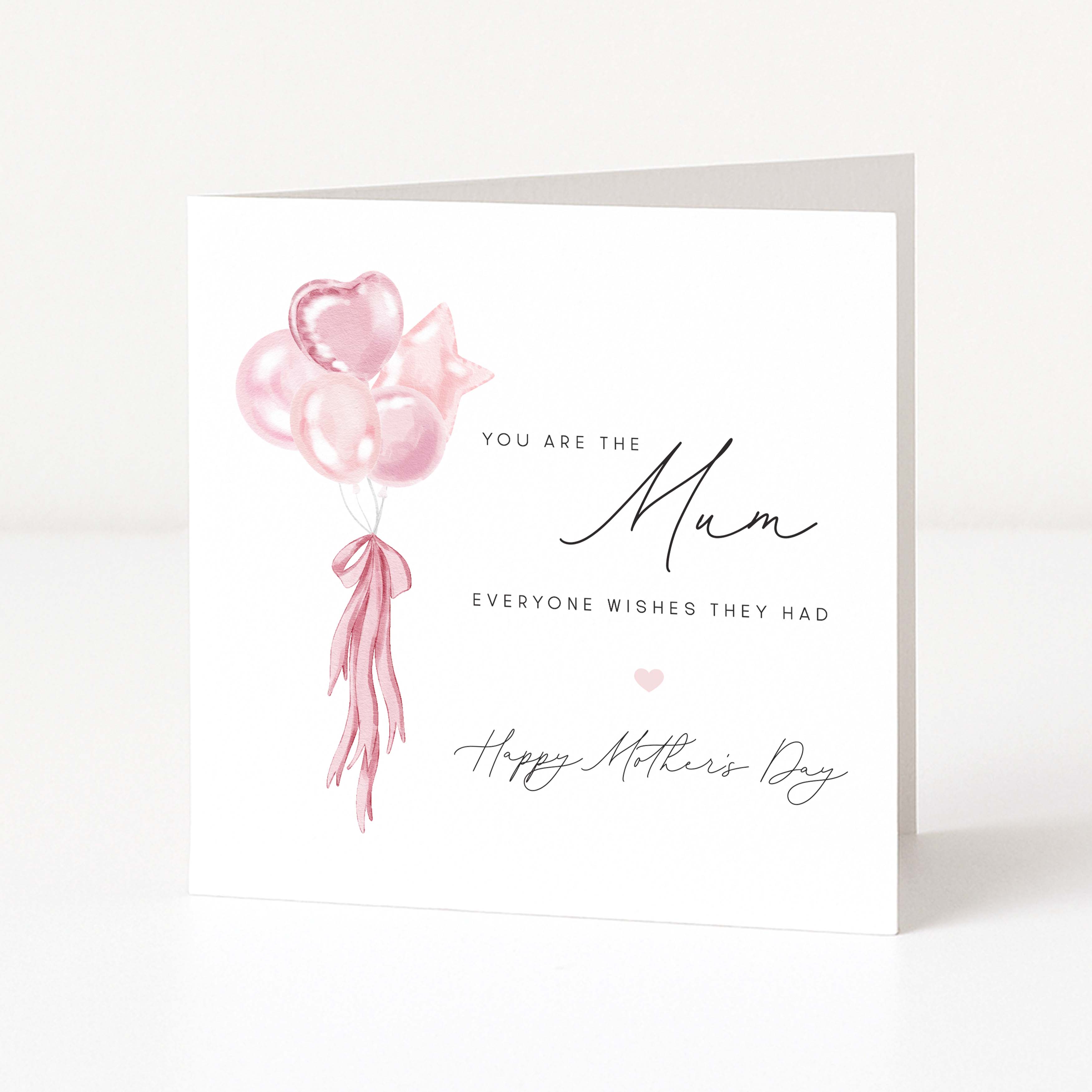 Greeting card with pink balloons and Mother's Day message on a white background