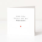 Card with text 'And you shall be my squishy' and a red heart on a white background
