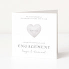 Engagement card with a heart design and personalized text on a white background