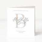 Personalised Engagement card with personalized text and monogram on a white background