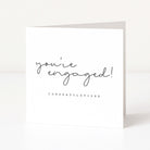 Greeting card with 'you're engaged! Congratulations' text on a white background