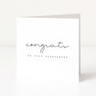 White card with 'Congrats on your engagement' text on a white background
