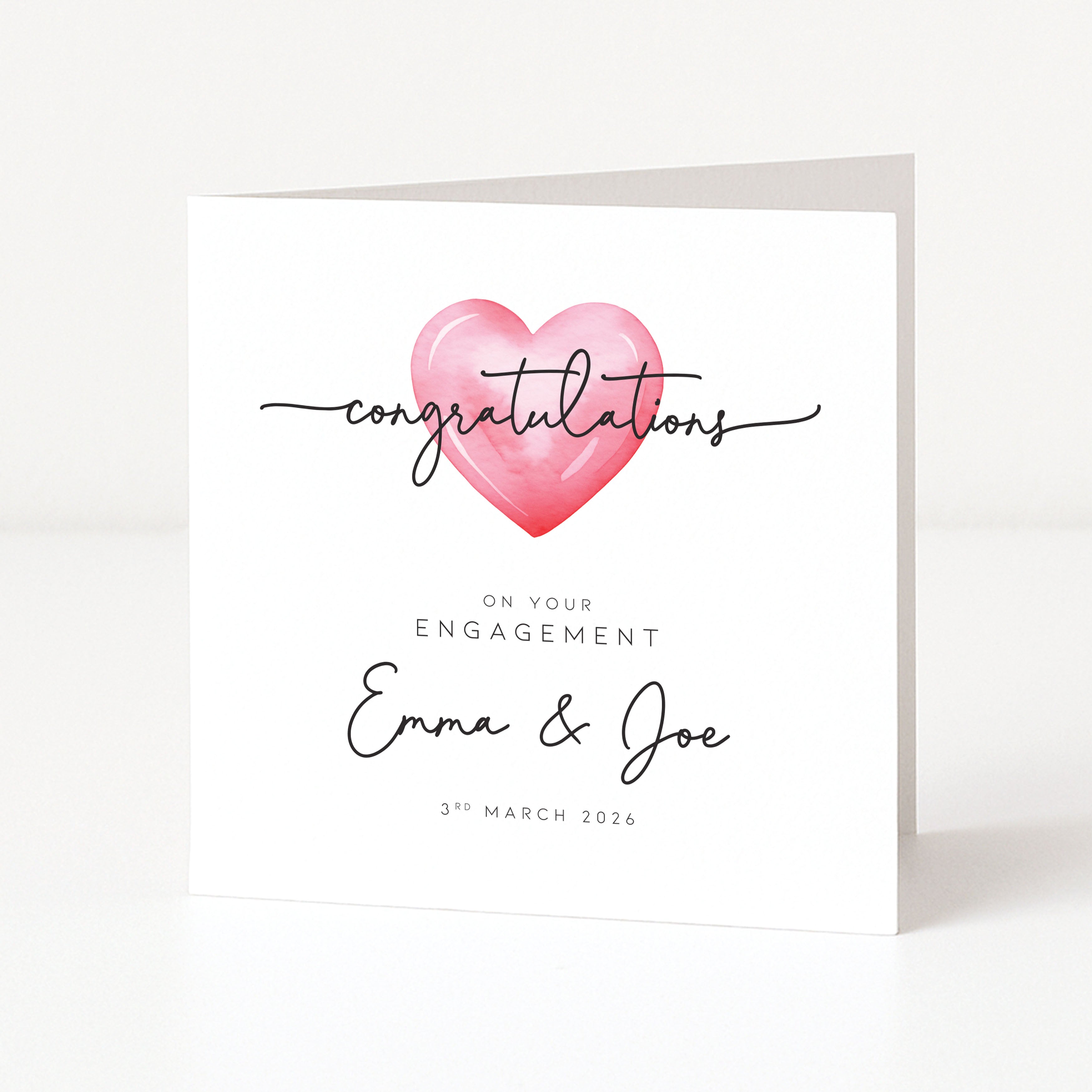 Engagement card with a pink heart and personalized text on a white background