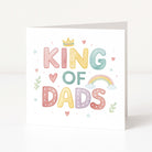 Father's Day greeting card with 'King of Dads' text in pastel colors on a white background