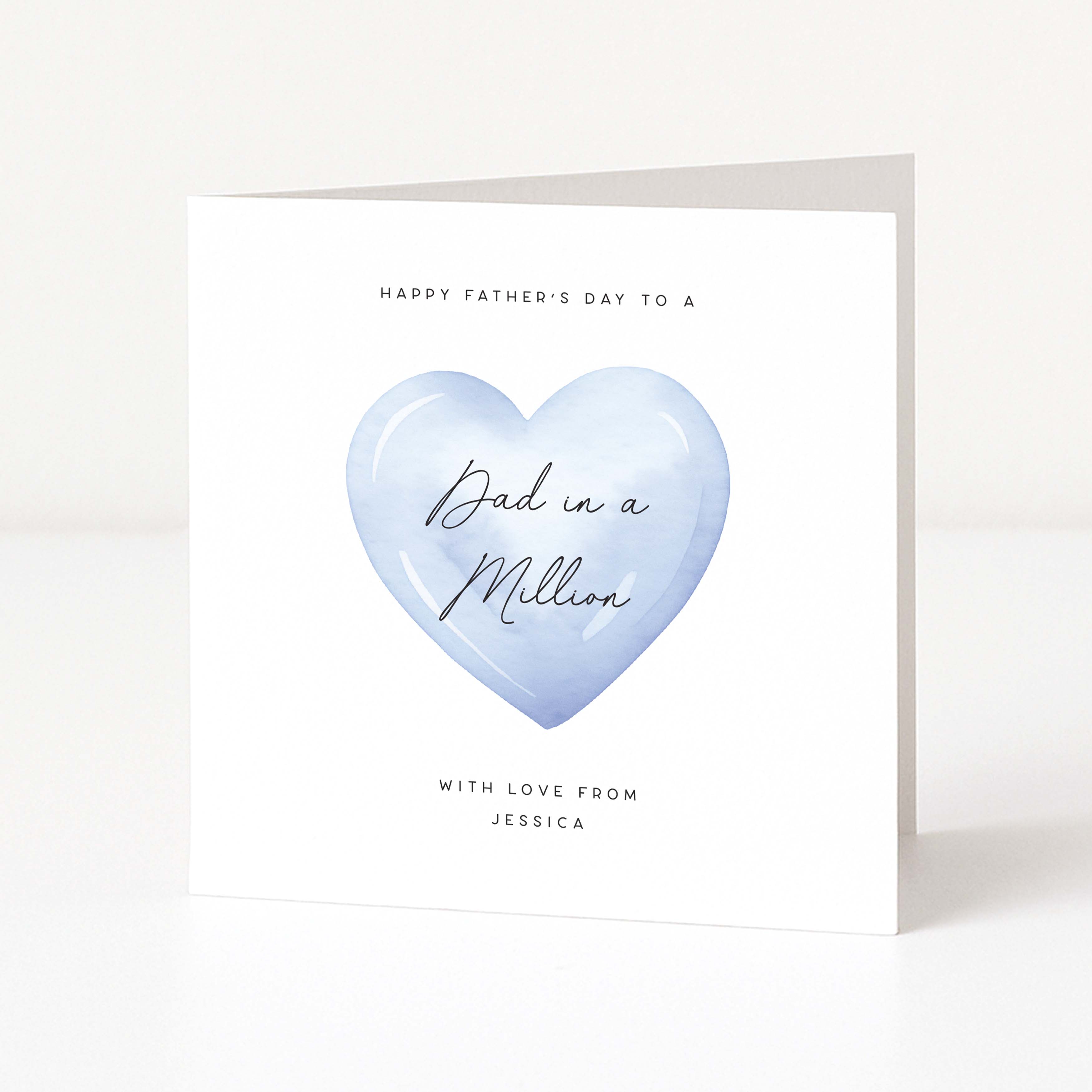 Happy Father's Day Card with a Blue Heart, 'Dad in a Million' text and personalised with sender's name