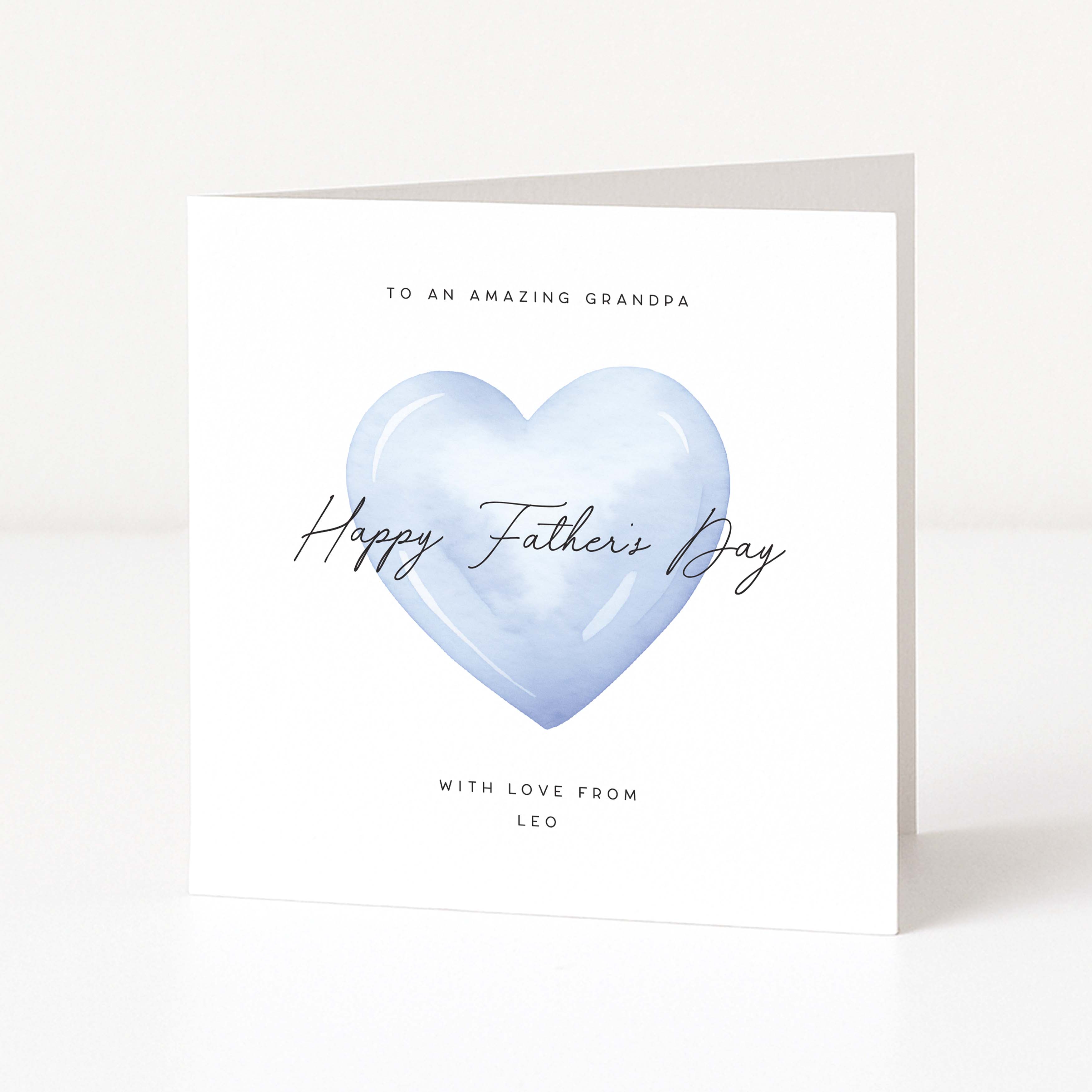 Father's Day card for an amazing grandpa with a blue heart and personalized text on a white background