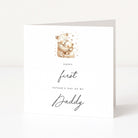 Greeting card for daddy's first father day with teddy bear illustration and text on a white background