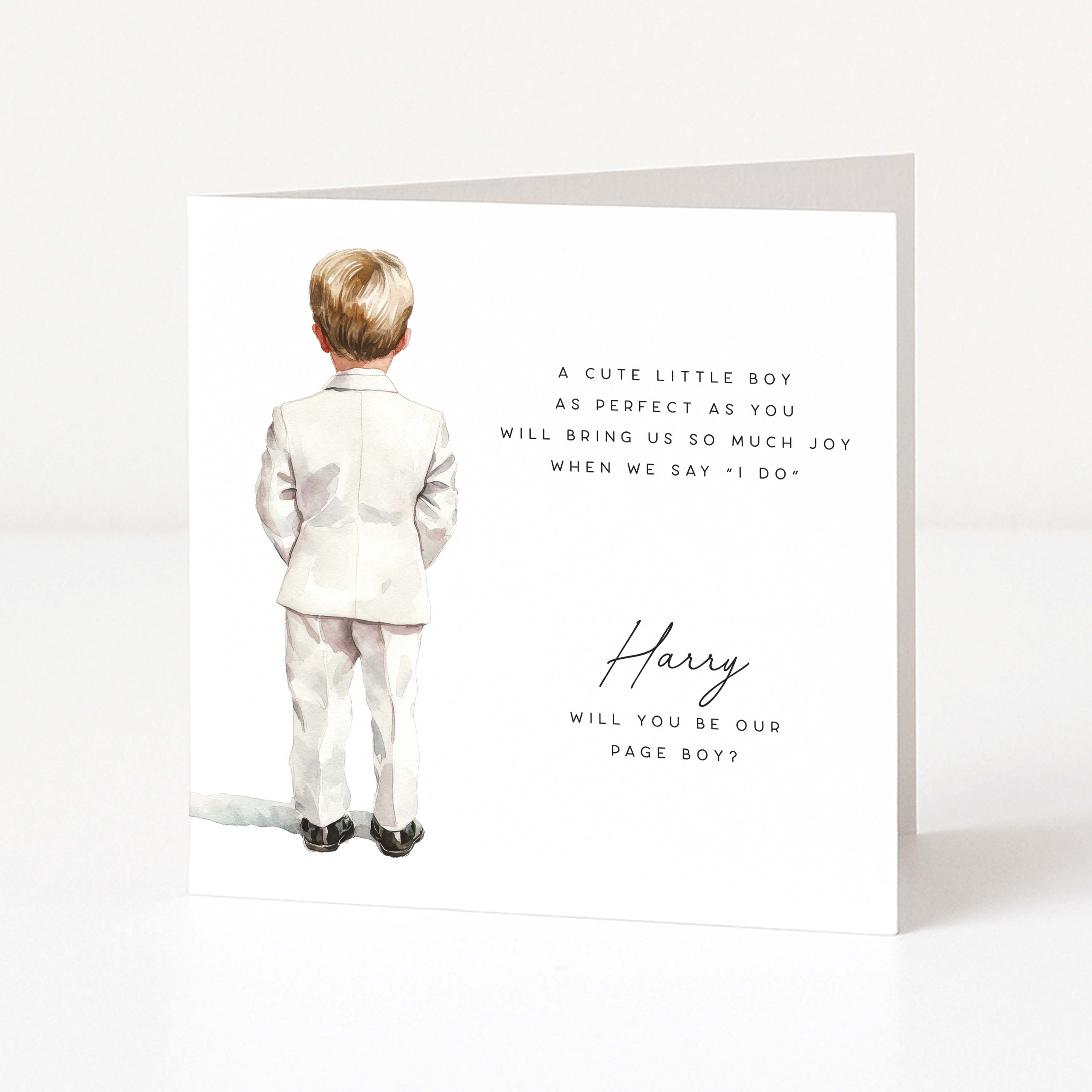 Greeting card with a young boy in a suit and a personalized will you be our page boy message on a white background