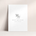 A wedding welcome sign featuring a stylised monogram and elegant text against a neutral background
