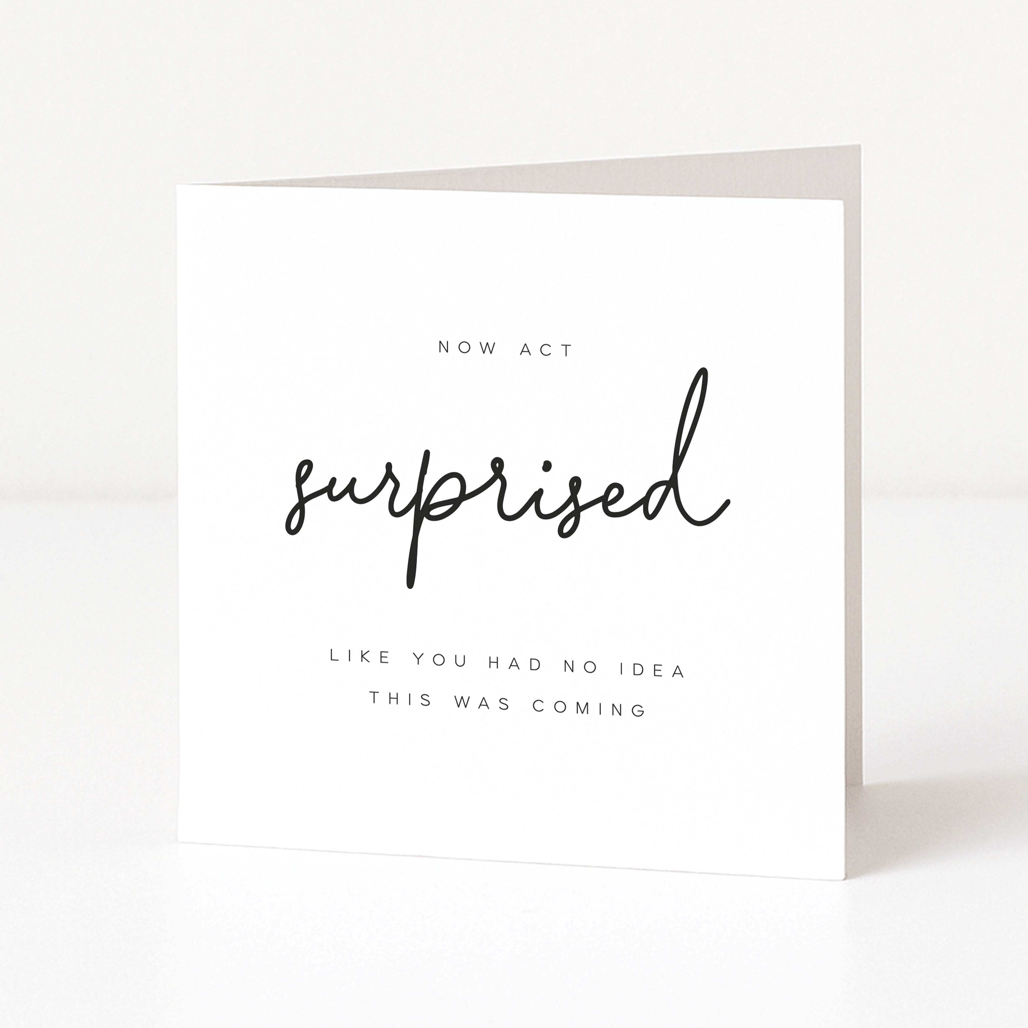 Greeting card with text 'Now act surprised like you had no idea this was coming' on a white background