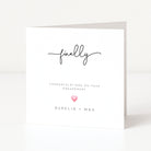 Engagement card with 'finally' and a heart on a white background