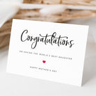Greeting card with 'Congratulations on having the world's best daughter' text on a light background