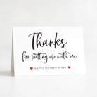 Greeting card with 'Thanks for putting up with me' text and 'Happy Mother's Day' on a white background