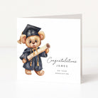 Graduation-themed card with a teddy bear holding a diploma and the text 'Congratulations James on your graduation'.