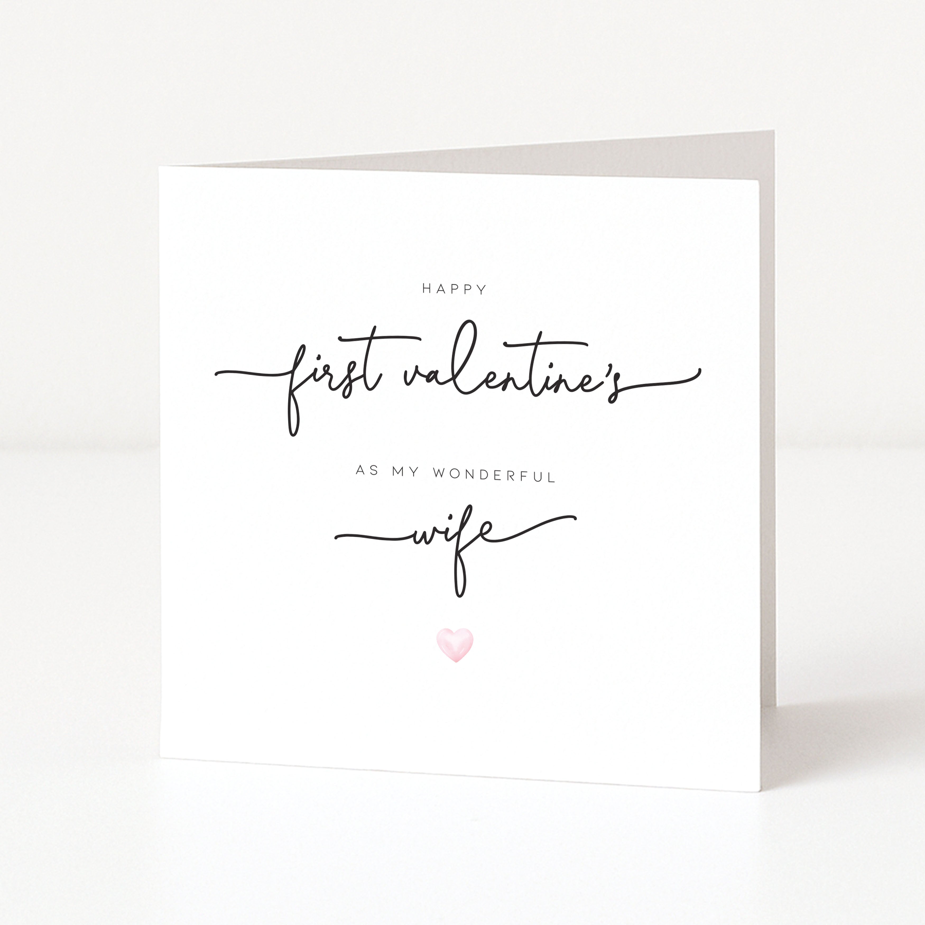 Greeting card with 'Happy first Valentine's as my wonderful wife' text on a white background