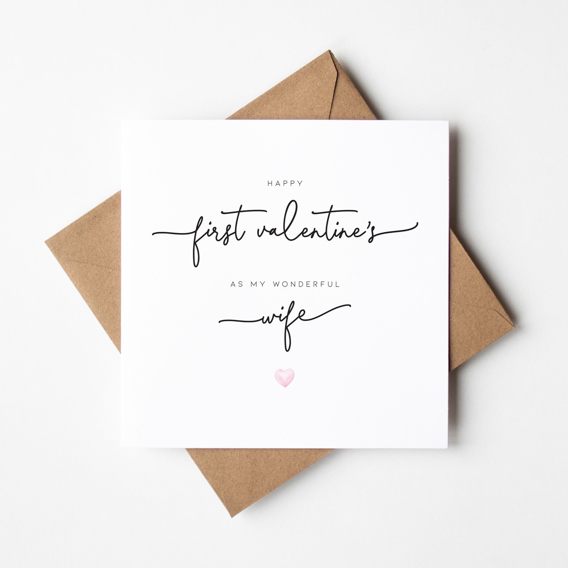 Greeting card with 'Happy first Valentine's as my wonderful wife' text on a white background