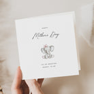 Greeting card with an elephant illustration and 'Happy Mother's Day' text on a soft beige background.