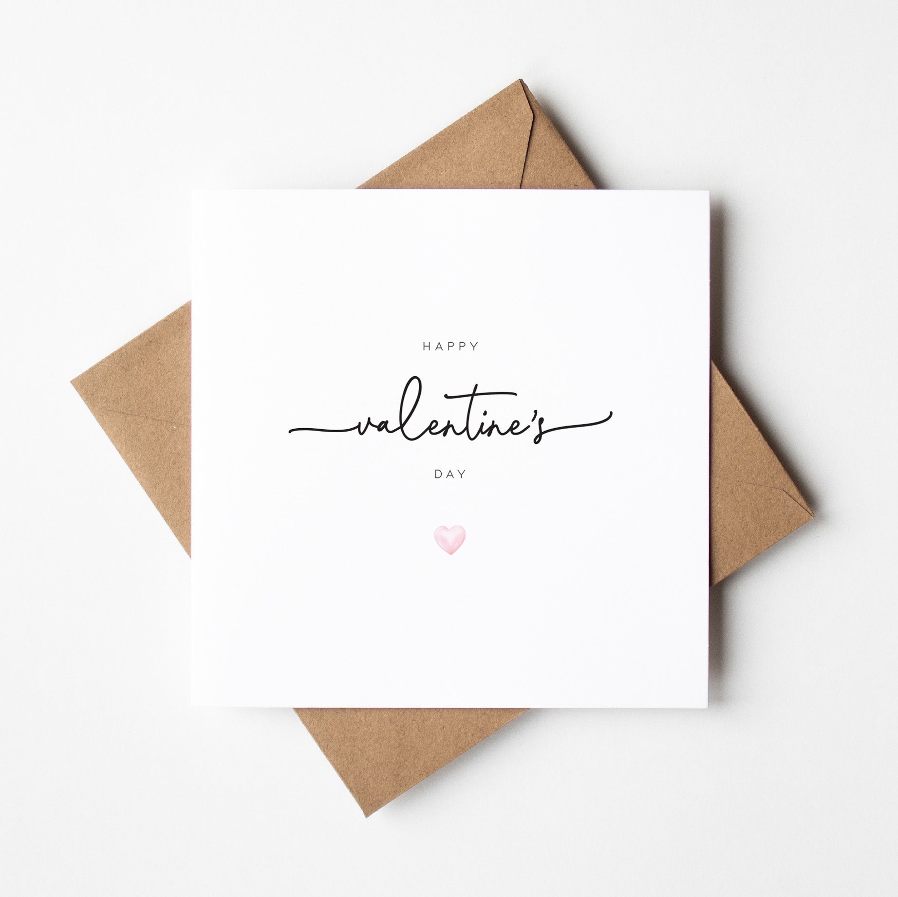 Valentine's Day card with a heart and 'Happy Valentine's Day' text on a white background.