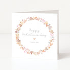 Valentine's Day card with heart wreath and 'Happy Valentine's Day, I love you' text on a white background