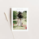 Wedding thank you card card with two women in white dresses holding hands on a grassy field, with 'Thank You' text above.