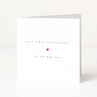 Greeting card with 'Our First Valentine's As Mr and Mrs' text and a red heart on a white background