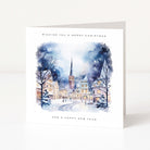 Christmas card with a snowy village scene and text 'Wishing you a Merry Christmas and a Happy New Year' on a white background.