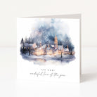A watercolour Christmas card showing a snowy village scene with "The most wonderful time of the year" text