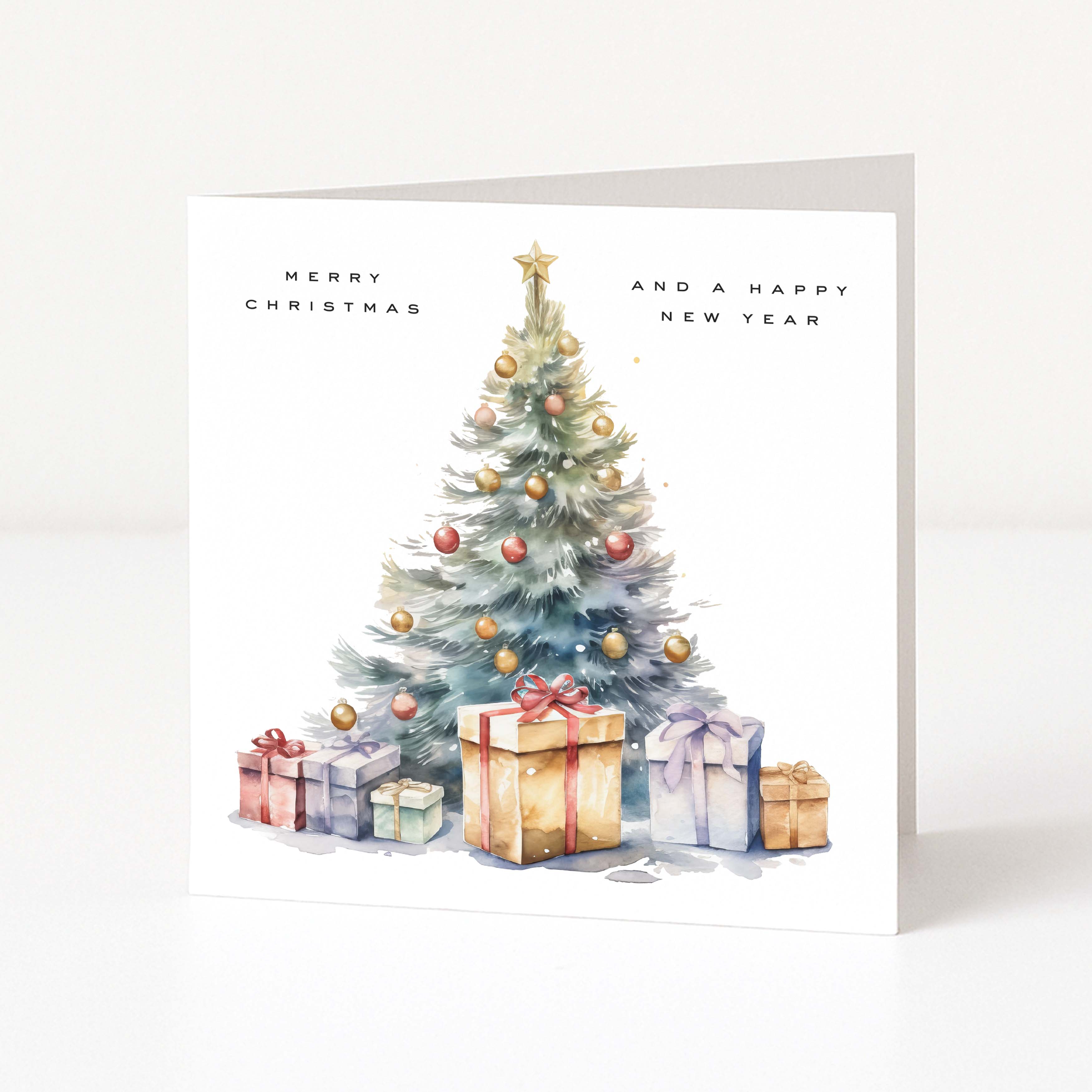 A square Christmas greeting card with a watercolor illustration of a decorated tree and wrapped presents, with the text 'MERRY CHRISTMAS AND A HAPPY NEW YEAR' on a white background.