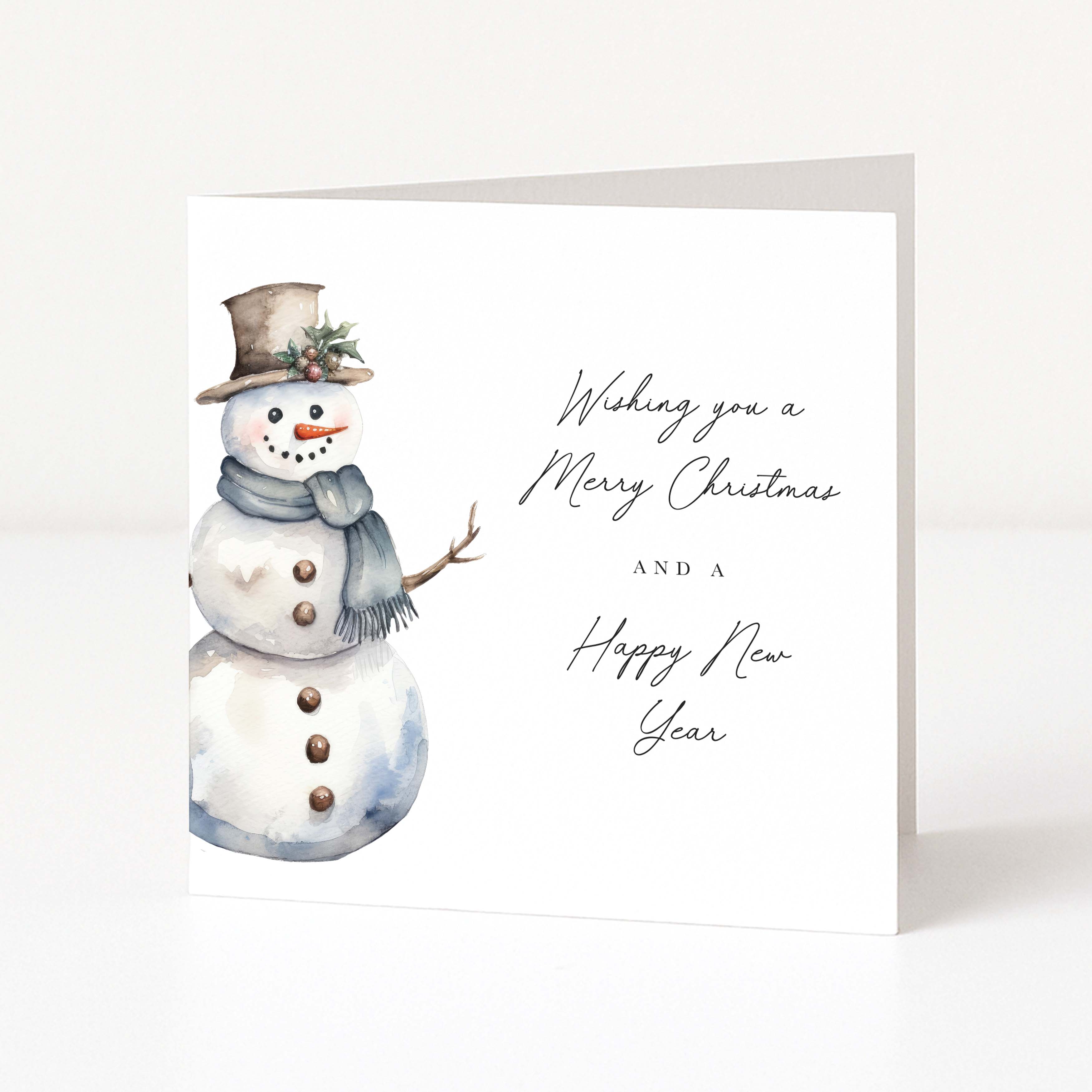 A square white Christmas greeting card standing upright, printed with a watercolor snowman wearing a brown top hat and blue-gray scarf on the left, and the text 'Wishing you a Merry Christmas AND a Happy New Year' in black script on the right.