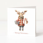 A white Christmas greeting card featuring an illustration of a moose wearing a red-and-orange plaid sweater and holding two wrapped presents, with 'Merry Christmas' printed below.