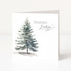 A white Christmas greeting card standing upright, featuring a watercolour-style evergreen tree on the left and the words 'Season's Greetings' in black script on the right.