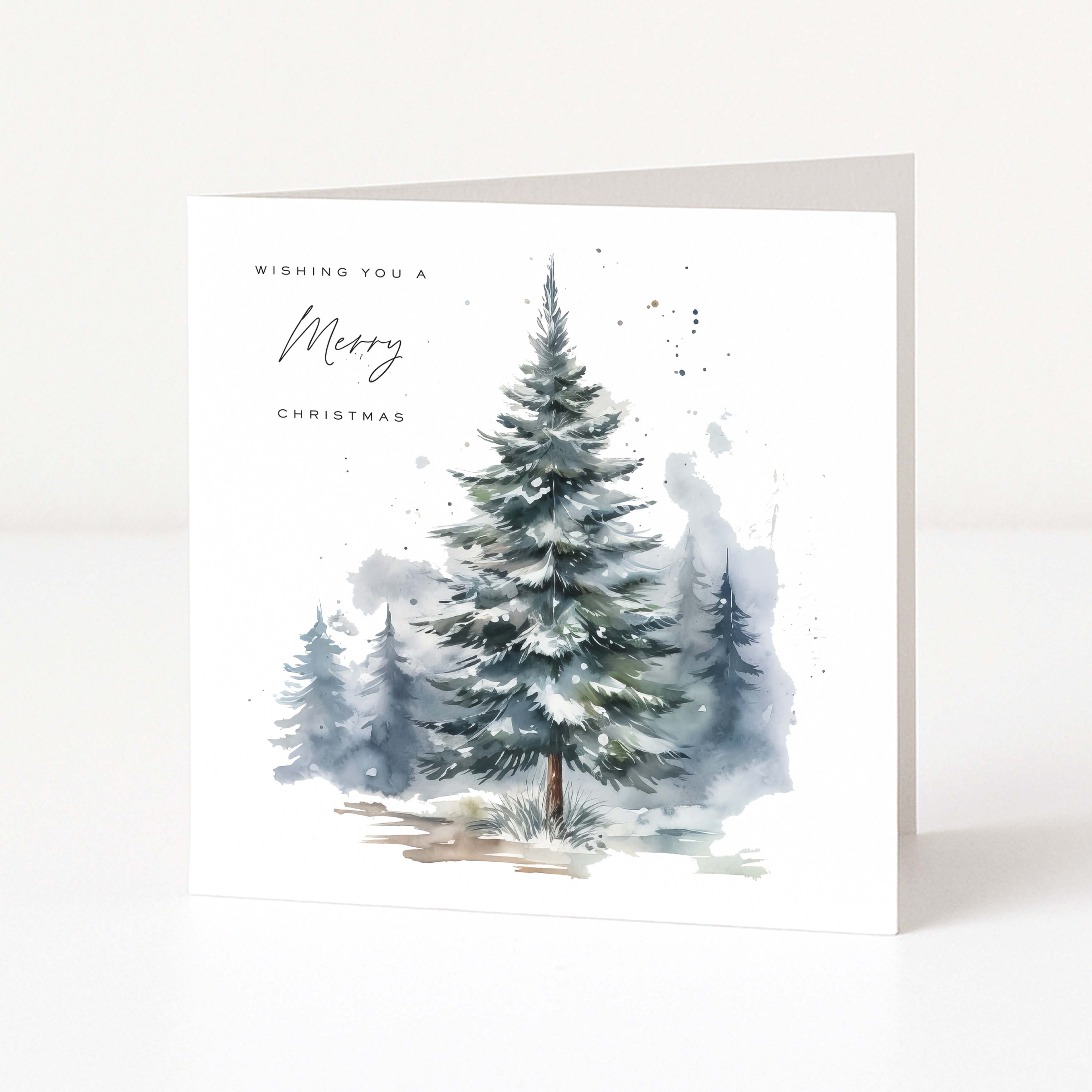 A square white Christmas greeting card with a watercolour illustration of snow-covered evergreen trees and the text 'Wishing you a Merry Christmas' on a clean white background.