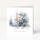 A Christmas greeting card showing a watercolour forest landscape and "all is calm, all is bright" text