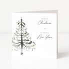 A square white Christmas greeting card standing upright on a white surface, featuring a watercolor-style Christmas tree on the left and the words “MERRY Christmas & A HAPPY New Year” on the right.